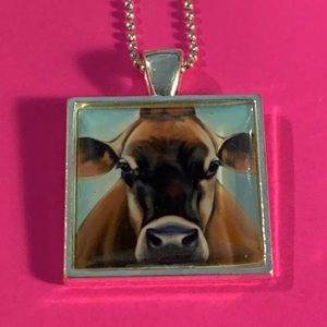 Steel Cow Greta pendant and necklace
